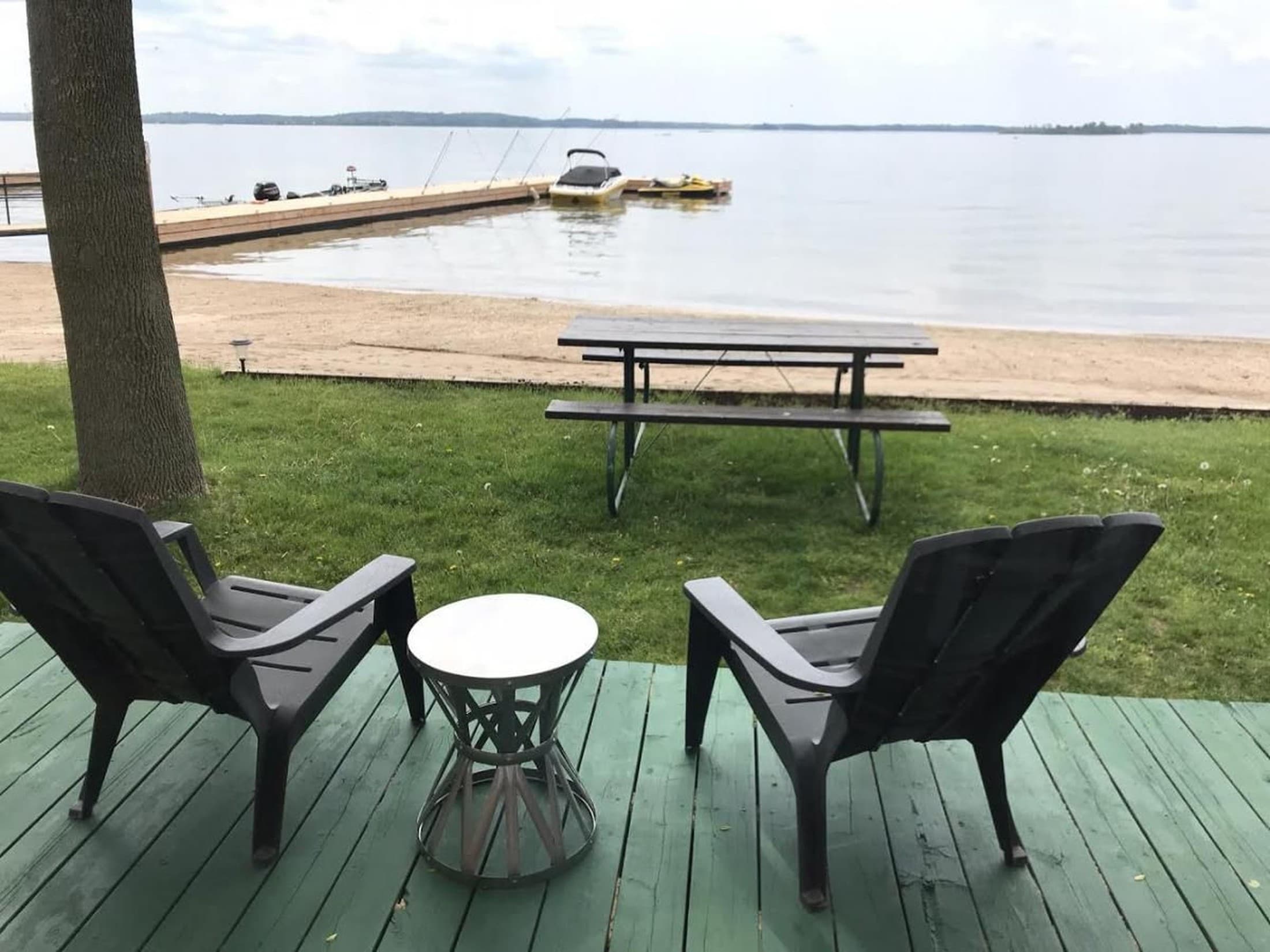 Waterfront and dock view at Harmer's Cottages.